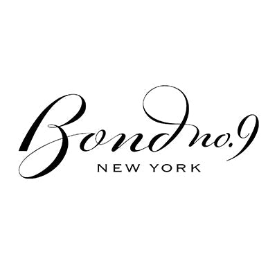 Bond No. 9 New York Oud perfume bottle with artistic cityscape design,Close-up of Bond No. 9 perfume bottle highlighting unique label art, Bond No. 9 gift set with vibrant packaging inspired by New York City