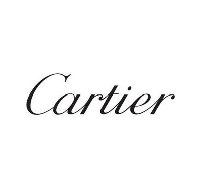 Cartier La Panthère perfume bottle with sculpted panther face inside, Cartier Baiser Volé Eau de Parfum in elegant gold and pink bottle, Collection of Cartier fragrances arranged on marble with jewelry accents