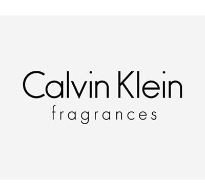 Calvin Klein CK One Eau de Toilette bottle with clear minimalist design, Collection of Calvin Klein perfumes displayed with clean modern styling, Woman applying Calvin Klein perfume in bright contemporary setting