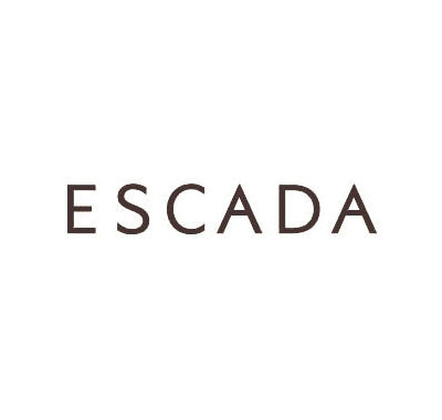 Escada Cherry in the Air perfume bottle with red gradient design and cherry illustrations, Escada Magnetism Eau de Parfum in bold pink sculpted bottle, Woman spraying Escada perfume in a sunny, carefree outdoor setting