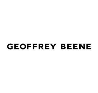 Geoffrey Beene Grey Flannel Eau de Toilette spray with flannel pouch, Geoffrey Beene Grey Flannel gift set including cologne and body wash, Geoffrey Beene Grey Flannel cologne bottle with box on marble surface