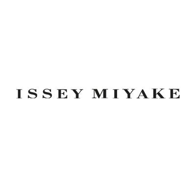 Issey Miyake L’Eau d’Issey Eau de Toilette bottle with minimalist cone design, Issey Miyake Fusion d’Issey bottle with deep blue glass and textured cap, Close-up of Issey Miyake fragrance bottle with Japanese-inspired lines